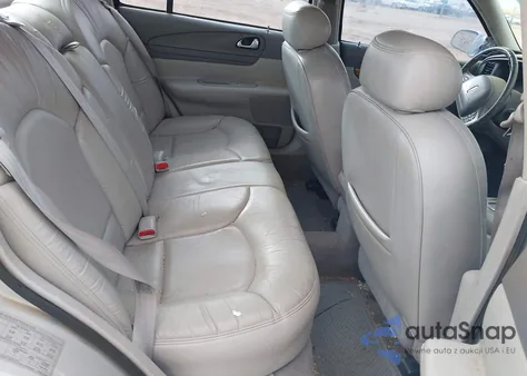 1998 Lincoln Continental z USA, uszkodzony, nr VIN 1LNFM97V8WY637860